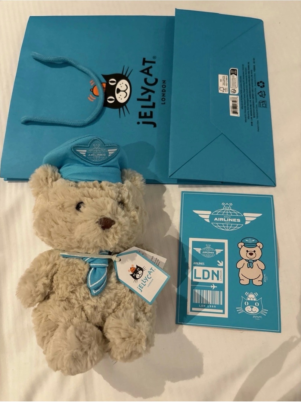 Exclusive Jellycat Cream Bear in Blue Airline Uniform Plush Harrords